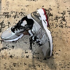 New Balance Silver and Black Athletic Shoes
